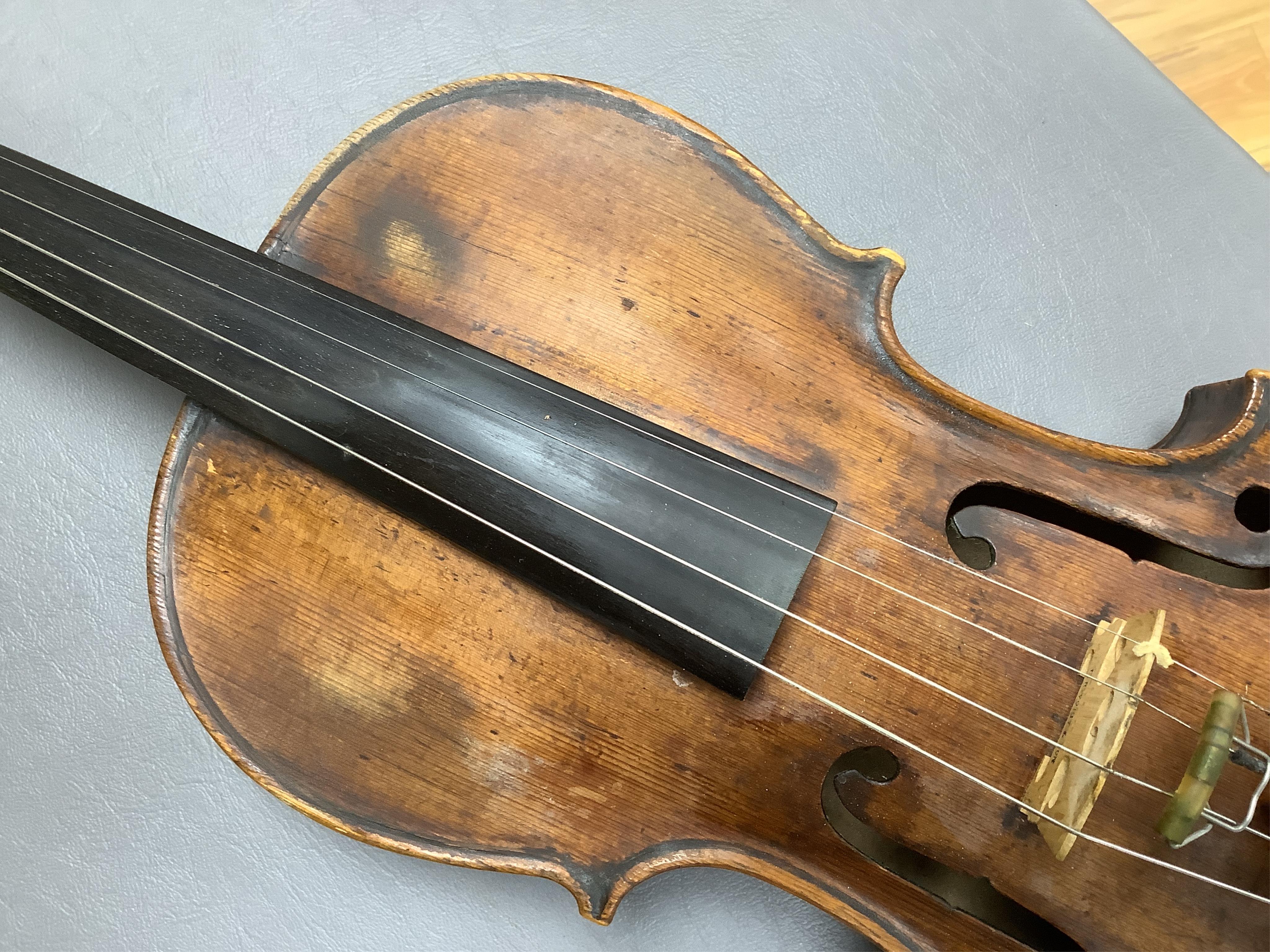 An interesting late 18th century violin, with one piece bird’s eye maple back, unsigned, with two silver fully mounted octagonal bows, one stamped Voight CITES Submission reference, 3XFNUBT7 and Submission reference, RHL